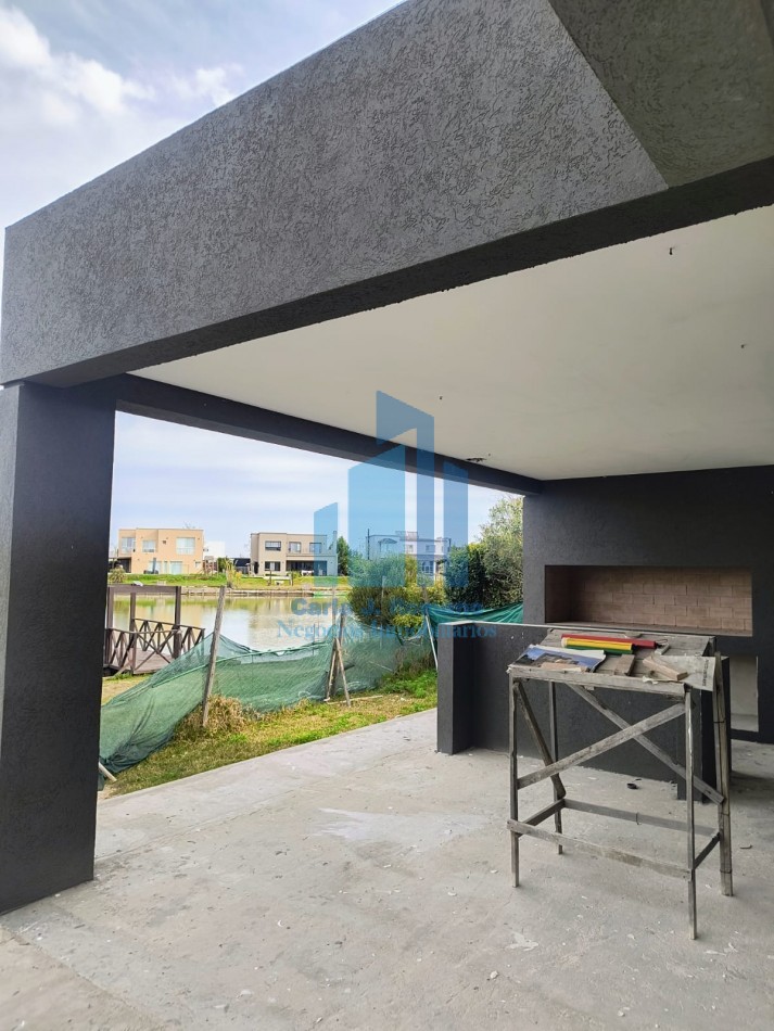 VENTA CASA A TERMINAR de 6 AMBIENTES EN BARRIO EL CANTON CON VISTA A LAGUNA , ESCOBAR