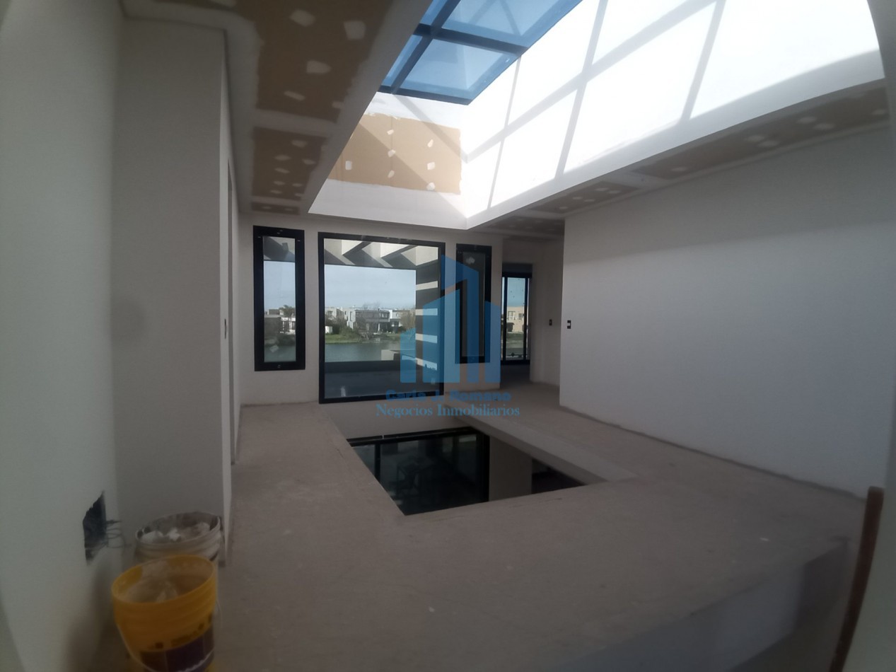 VENTA CASA A TERMINAR de 6 AMBIENTES EN BARRIO EL CANTON CON VISTA A LAGUNA , ESCOBAR